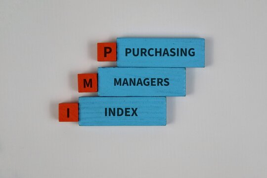 Wooden blocks spell out Purchasing Managers Index (PMI) on a white background, symbolizing business performance, economic indicators, market analysis.