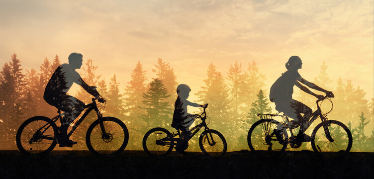 Family cycling together at sunset, active lifestyle and togetherness concept
