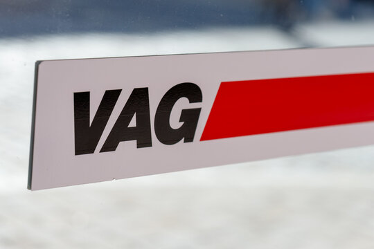 Vag text logo on public transportation vehicle showing branding