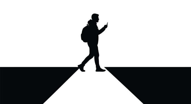 Silhouette of a man with a backpack walking on a narrow path while looking at his smartphone, minimalist concept of digital distraction