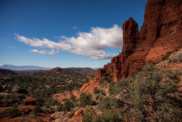 Naklejka premium Red rock mountain landscape in Sedona Arizona with blue sky and clouds