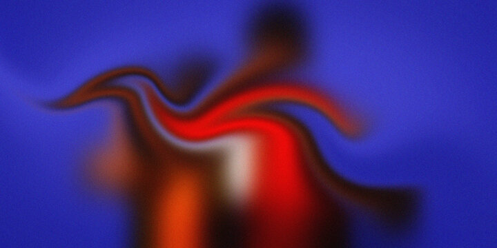 A Blurry Image of a Person in Red and Orange with a Blue Background