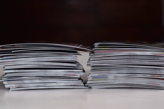 Two stacks of sports trading cards with no visible players. Generic collectible card piles for concept use in hobby, collecting, and trading themes