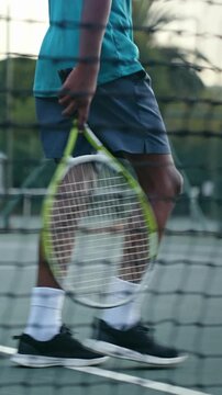 child and walk on tennis court for fitness, training and equipment for game in summer. Kid, outdoor and racket at net for match.