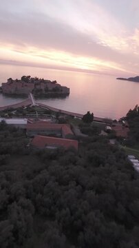 Aerial View of Sveti Stefan Montenegro during Golden Hour with Pink Sky