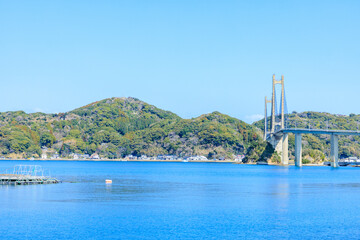 初春の呼子大橋　佐賀県唐津市　Yobuko Bridge in early spring. Saga Pref, Karatsu City. © M・H