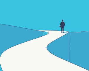Obraz premium Business person stands on path between two cliffs under blue sky in a symbolic view of risk and opportunity