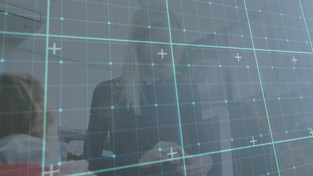 Standing teacher smiling, shifting gaze and hands, manipulating token and guiding right child focus