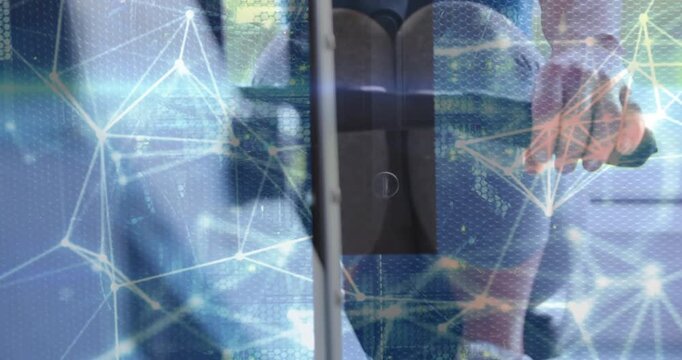 Woman on rower rowing after console reveal, network overlay marking motion for fitness