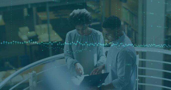 Colleagues reviewing business papers woman tapping phone man operating laptop teal overlay guiding