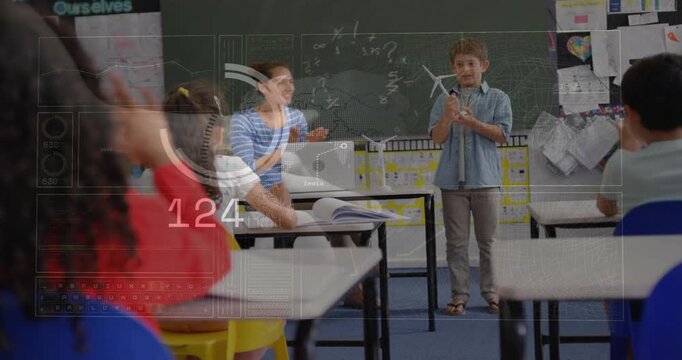 Boy lifting wind-turbine model, presenting for science class, HUD tracking numbers peaking