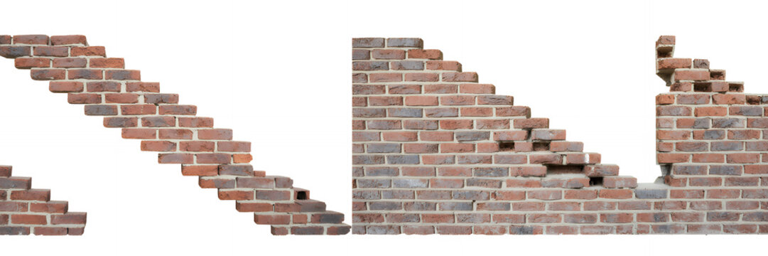 Broken red brick wall sections on white background