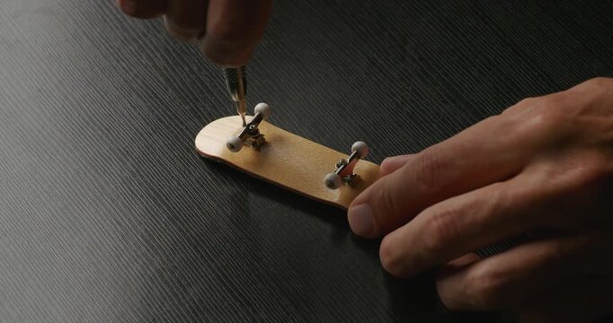 Assembly wooden fingerboard skateboard.	