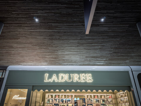 PARIS, FRANCE - MARCH 6, 2026: Laduree storefront at Paris Charles de Gaulle Airport. patisserie laduree is a french pastry shop known for its macarons.
