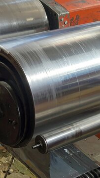 A close-up view of industrial metal rollers