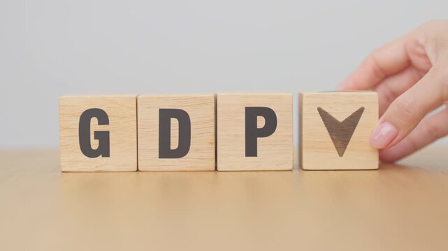 hand change wooden block with GDP text to UP and Down arrow symbol icon. Gross domestic product, Financial, Management, Economic growth, consumption, investment, government purchases and net exports