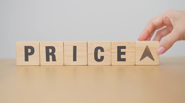 hand change wooden block with PRICE text to UP and Down arrow icon. Sale marketing, Price decrease and Increase Financial, money Value, discount, consumption, investment and purchases concept