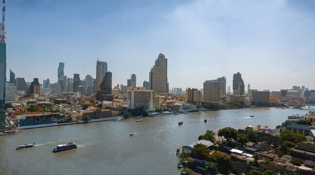 Bangkok skyline and business skyscrapers at Chaopraya river, Thailand.