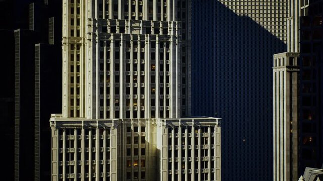 Textured facade detail Seattle midday light, perforated panels and repeating grid, closeup of surface, strong tonal contrast, modern materiality