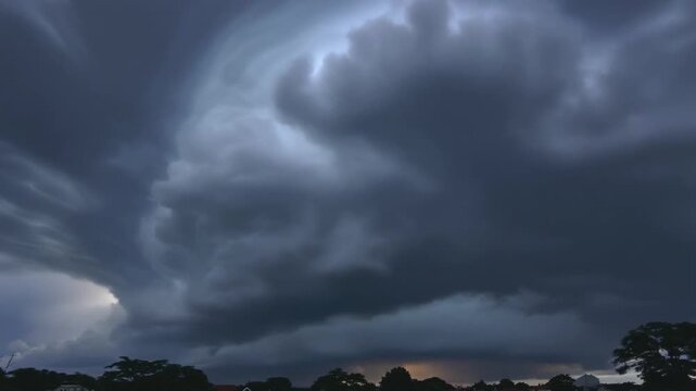 Dramatic Stormy Sky with Dark Clouds Gathering Over Landscape