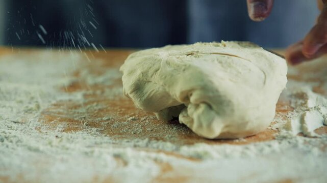 Kneading Dough On Wooden Table With Flour. Handcrafted Pastry Making
