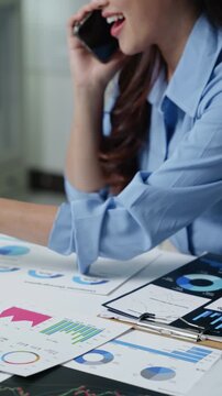 Businesswoman collaborating on data analysis office digital reports professional environment close-up view productivity concepts