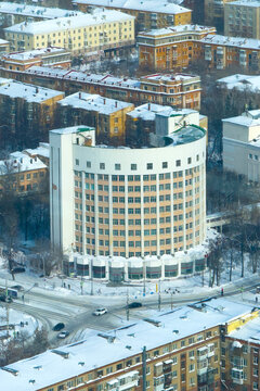 Yekaterinburg, Russia, March 9, 2026: Aerial view of the historic Iset Hotel and Chekist Village (Gorodok Chekistov) in Yekaterinburg, Russia. Constructivist architecture in winter.