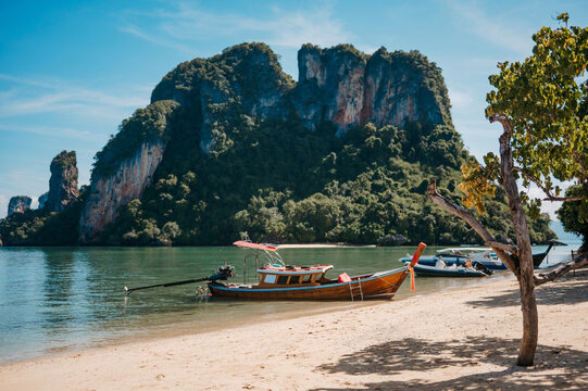 Longtail boats on beach at Pak Bia Island, Hong Islands, Krabi