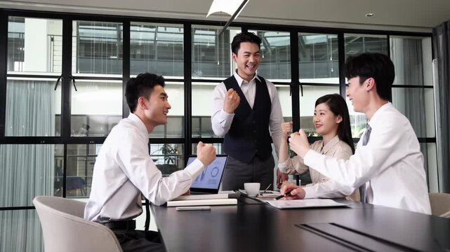 Professional business coworkers actively engaged in productive meeting, discussing strategies, collaborating on projects in positive and upbeat work atmosphere of team. Showcasing teamwork dedication