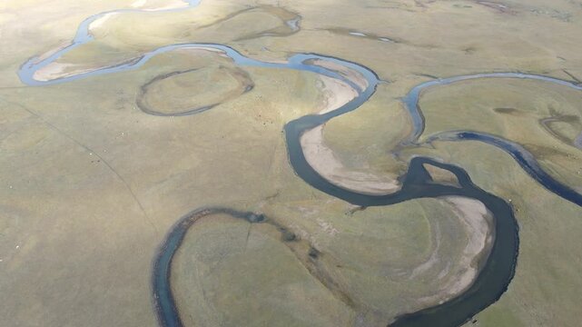Top Down Drone Flight Over Meandering River in Hulunbuir Grassland China