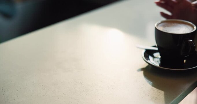 People, hands and coffee in cafe for order, hospitality industry and retail sale for offer. Giving drink, customer and barista in restaurant, service for latte purchase and support for small business