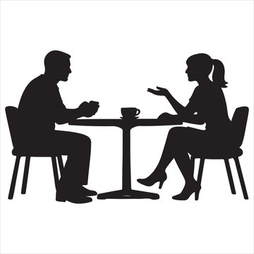 A man and woman sitting at a table talking