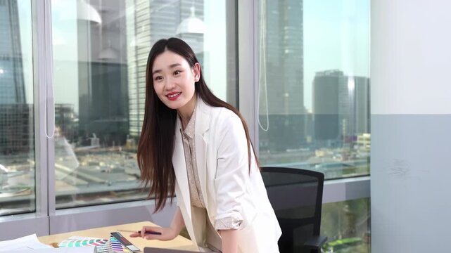 Businesswoman talking with colleagues exchanging ideas together at office using laptop. A group of business people engages in crucial corporate meeting, presenter discusses sample analysis results