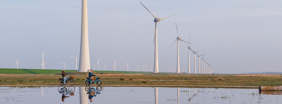 Exploring the wind farms of Urk, Flevoland with futuristic turbines and stunning reflections