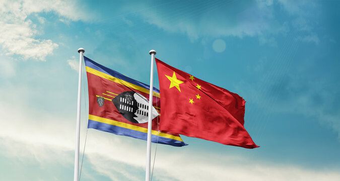Eswatini national flag fluttering. The flag blowing in beautiful soft sky. Eswatini china national flag for agreement.