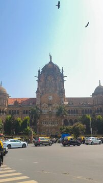 Cinematic 4K Video of Chhatrapati Shivaji Maharaj Terminus with Ornate Gothic Architecture, UNESCO World Heritage Site and Iconic Mumbai Railway Station with Historic Stonework and Dome