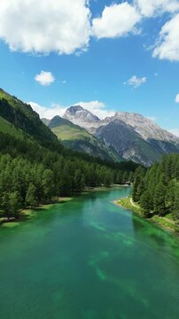 Lai da Palpuogna Palpuognasee pristine mountain lake Albula Pass Grisons, Switzerland vertical video