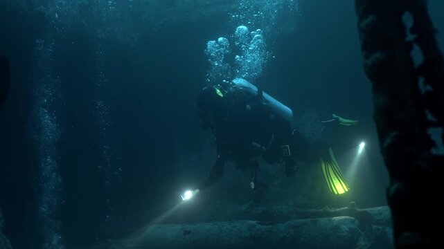 Scuba diver ventures in the legendary SS Thistlegorm shipwreck in the northern Red Sea off Egypt's coast.