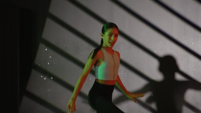 Young modern girls in dance class performing