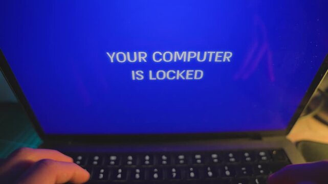 Person working on laptop when alert message pop and computer is locked and hacked by hacker group or spy. Remote access of device by malware or ransomeware taking over pc. Warning notification in blue