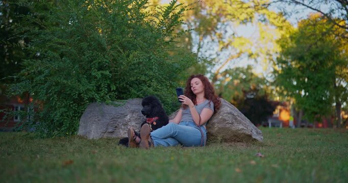 Young woman breaks up with her ex and finds comfort with her dog.