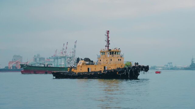 Kaohsiung Harbor Series - Yellow Tugboat Underway with Port Cranes in Background