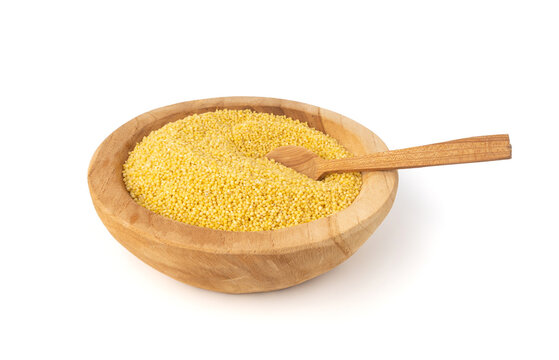 Raw millet grains pile isolated. Little yellow cereal, natural foxtail small seeds