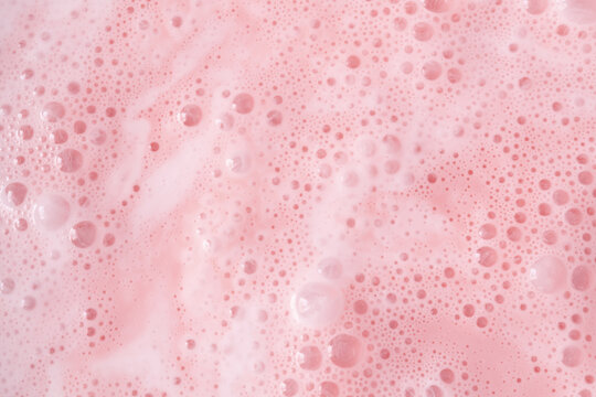 Pink milkshake texture closeup