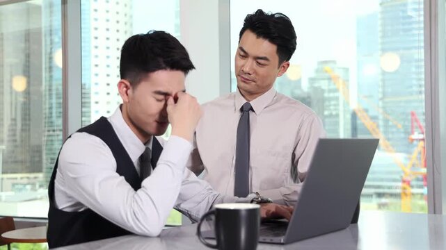 Businessman headache and team helping in office with support, care for pain or mistake and encourage colleagues. Stress, collaboration and help coworkers in office for frustrated, 404 crisis