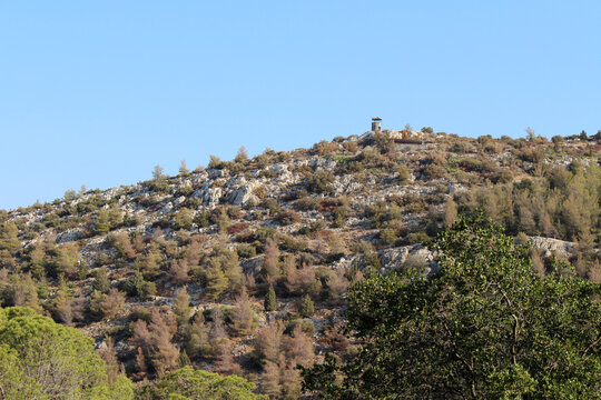 Mount Hymettus landscape watchtower August 2024 Pine forest and rocky hillside Athens