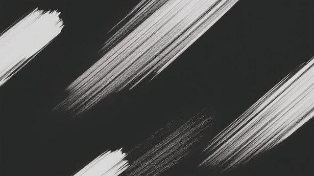 White brush strokes on a black background create dynamic streaks