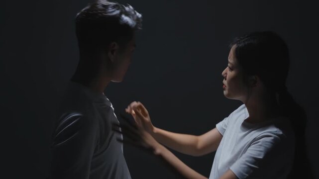 Stressed young couple divorce decree, relationship problems crisis conflict, emotions run high as they face the end of their marriage, reflecting sadness and frustration.