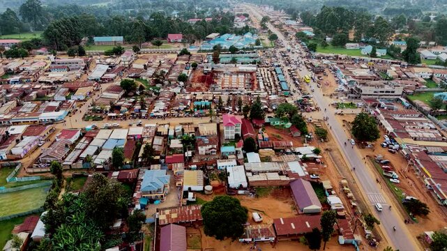 Rural cityscape kenya city skyline. Rural village of kenya. Aerial drone rural towns of kenya- slums . Sunset view of the small village in kenya. Roads of kenya.