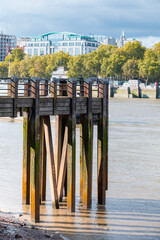 Fototapeta premium Wooden pier on the Southbank of River Thames, City of London, UK